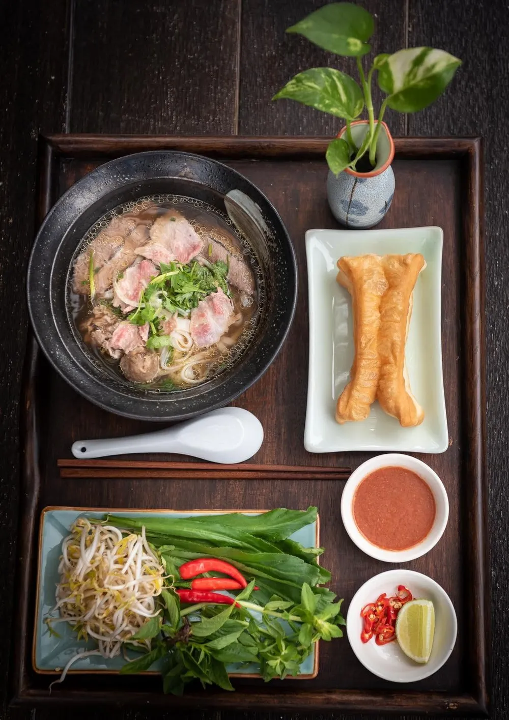 A classic bowl of phở bò (beef pho) at Bassac Pho in BKK1, one of Phnom Penh's first dedicated Vietnamese noodle specialists
