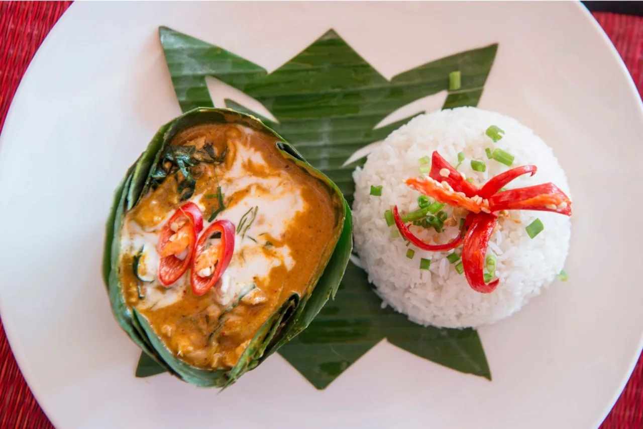 Fish amok — freshwater fish steamed in a coconut and kroeung custard, Cambodia's national dish
