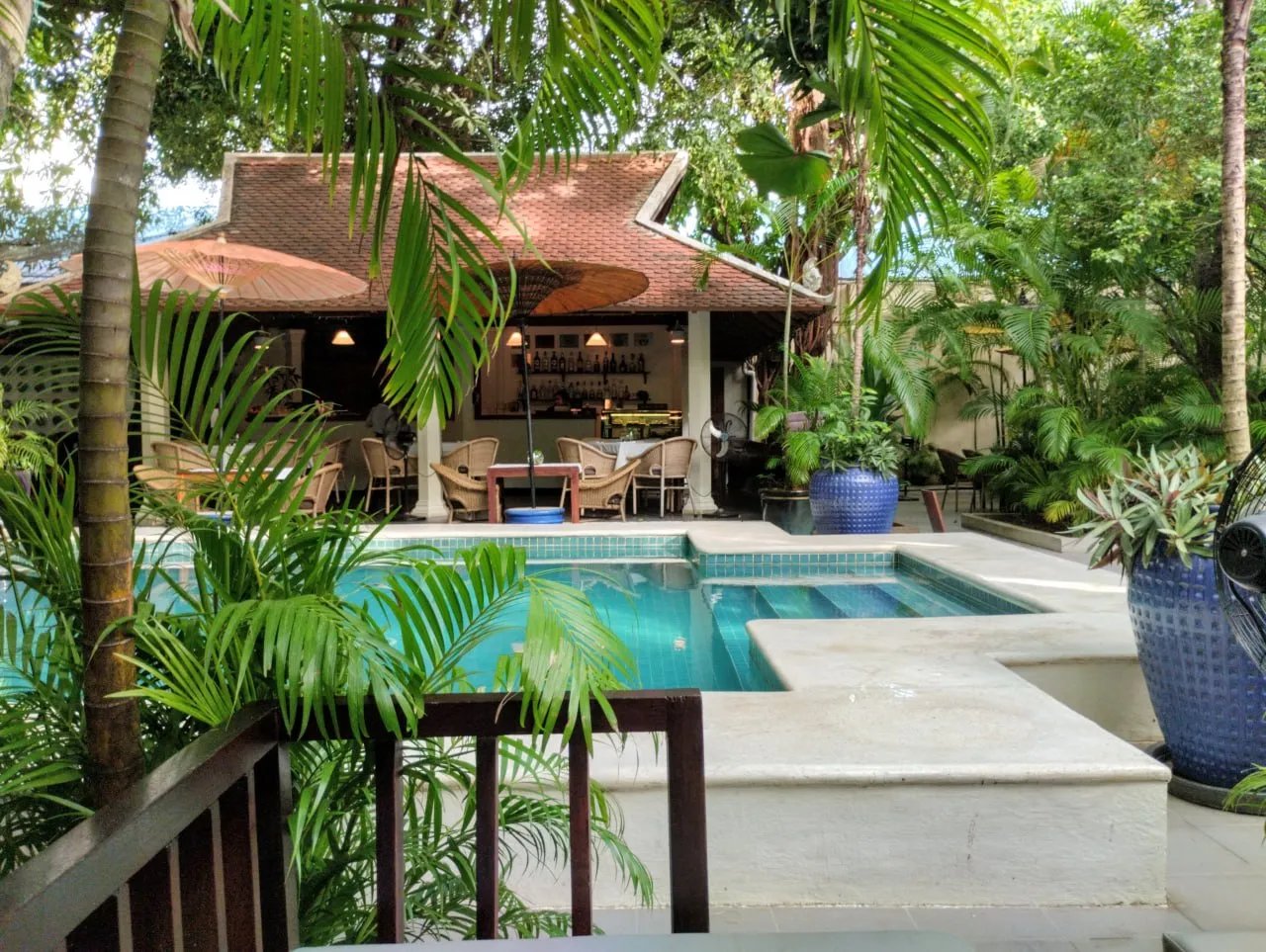The frangipani-shaded garden pool at The Pavilion, a few steps from the Royal Palace